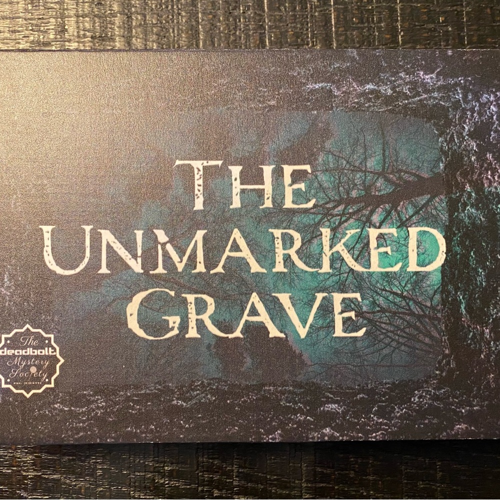 The Deadbolt Mystery Society The Unmarked Grave Murder Mystery game